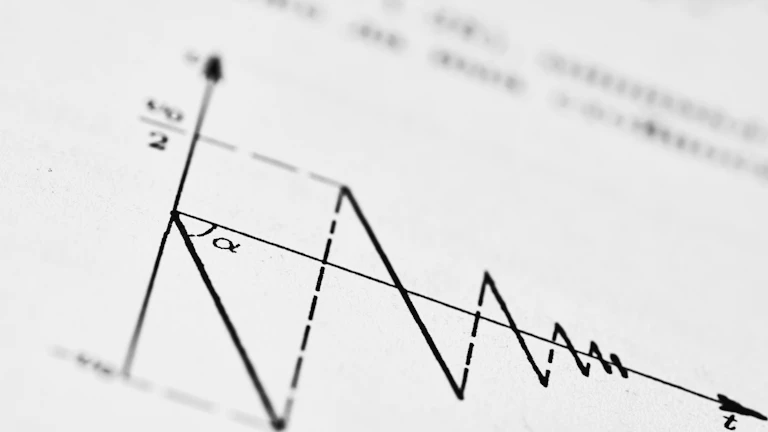 가격 변동성을 보여주는 빨간색과 녹색 선이 있는 차트